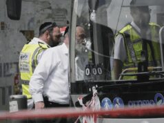 Palestinian gunmen kill six in Jerusalem bus stop attack
