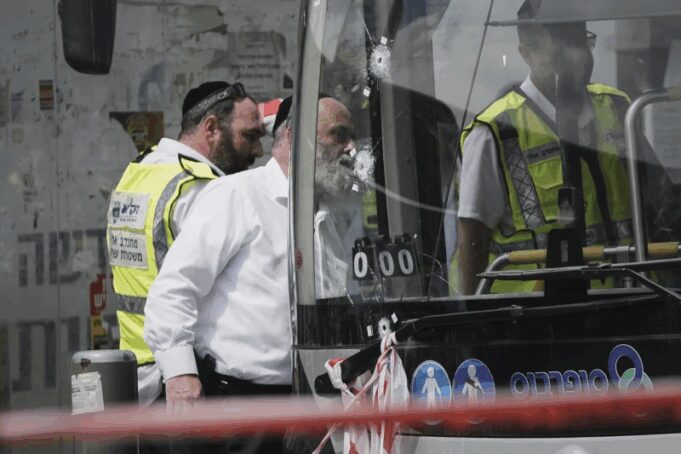 Palestinian gunmen kill six in Jerusalem bus stop attack